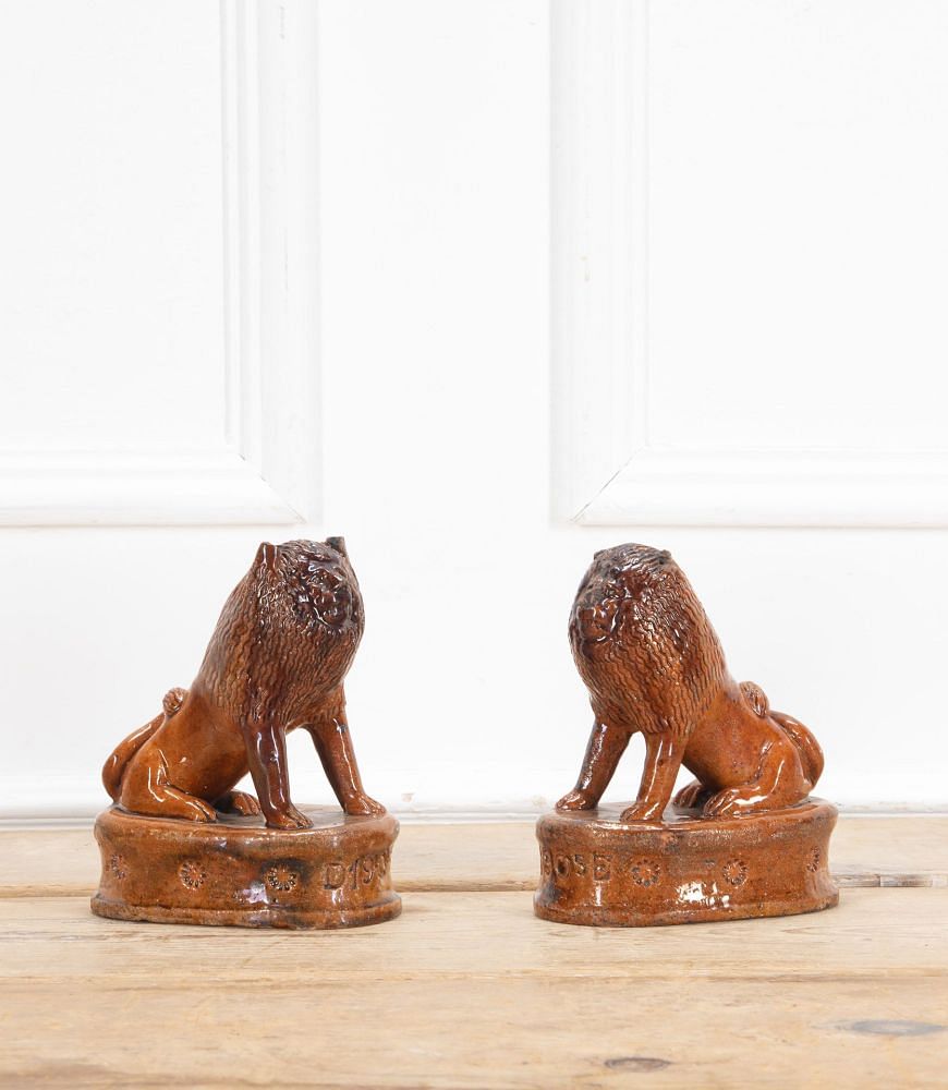 Pair of Early 20th Century English Terracotta Treacle Glazed Staffordshire Lions DA3438703