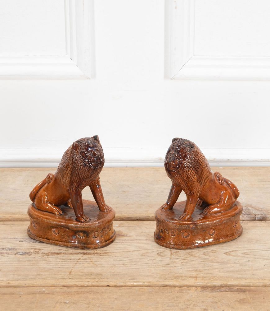 Pair of Early 20th Century English Terracotta Treacle Glazed Staffordshire Lions DA3438703