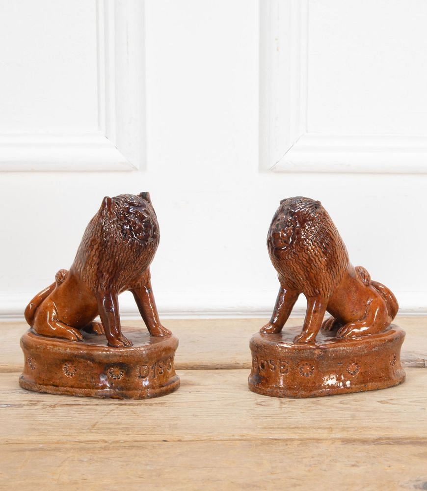 Pair of Early 20th Century English Terracotta Treacle Glazed Staffordshire Lions DA3438703