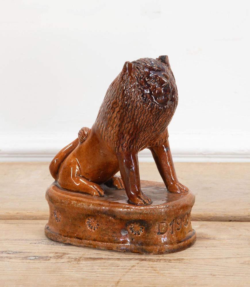 Pair of Early 20th Century English Terracotta Treacle Glazed Staffordshire Lions DA3438703