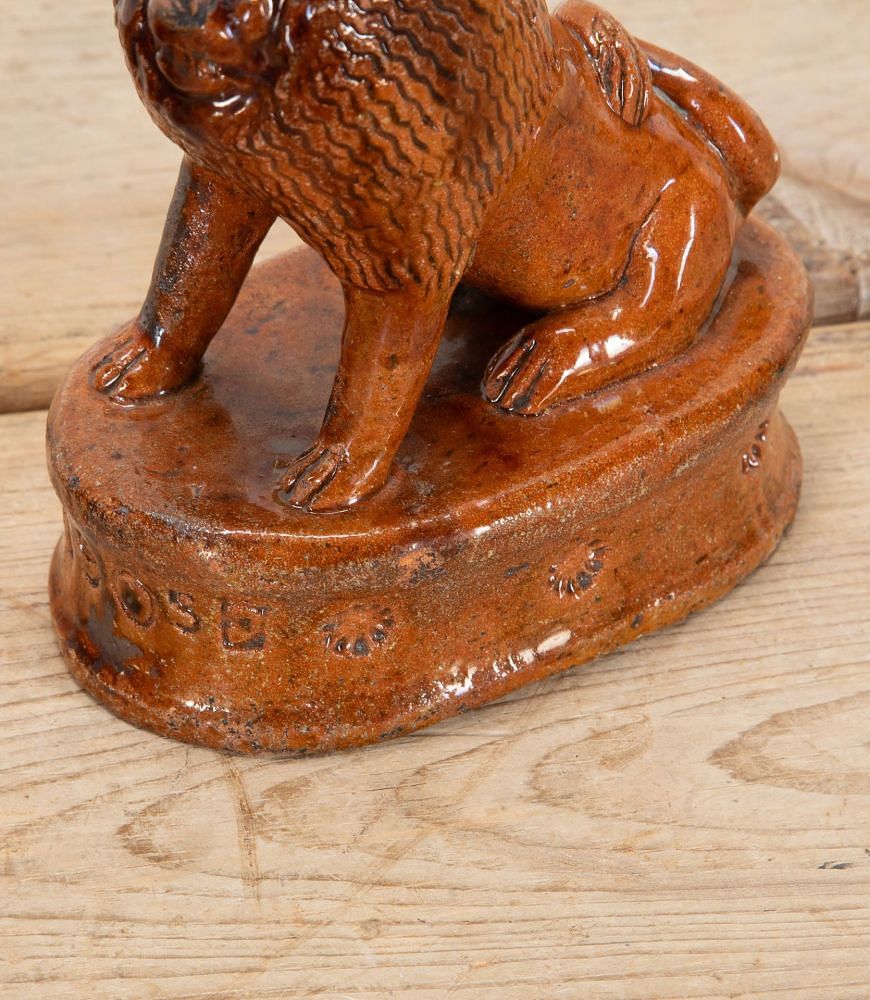 Pair of Early 20th Century English Terracotta Treacle Glazed Staffordshire Lions DA3438703