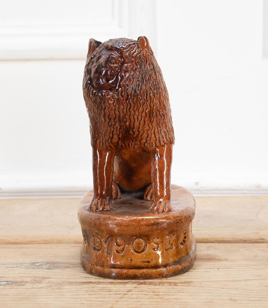 Pair of Early 20th Century English Terracotta Treacle Glazed Staffordshire Lions DA3438703
