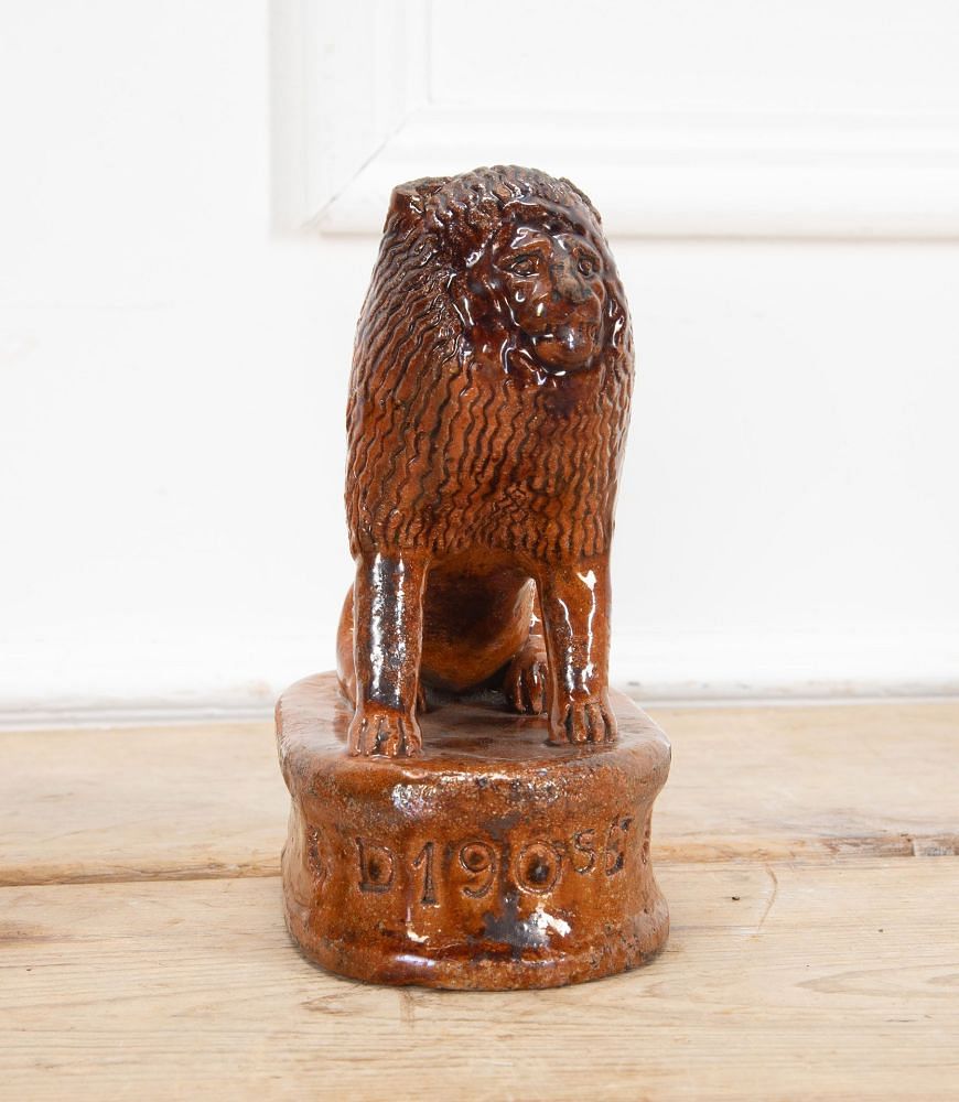 Pair of Early 20th Century English Terracotta Treacle Glazed Staffordshire Lions DA3438703