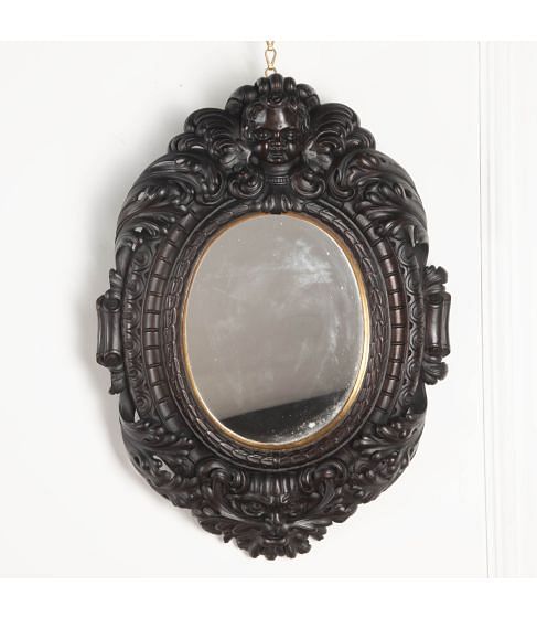 19th Century Renaissance Style Carved Oval Mirror