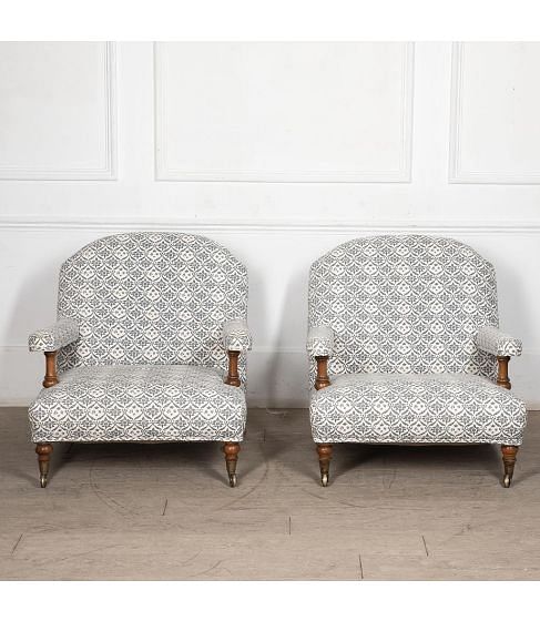 Pair of Howard and Sons Open Armchairs