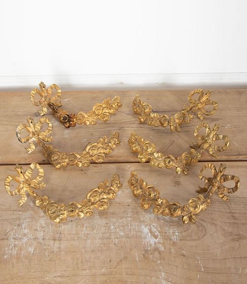 Set of Three 20th Century Pairs of Gilt Curtain Stays