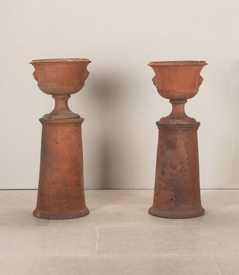 Pair of 19th Century British Terracotta Urns on Plinths