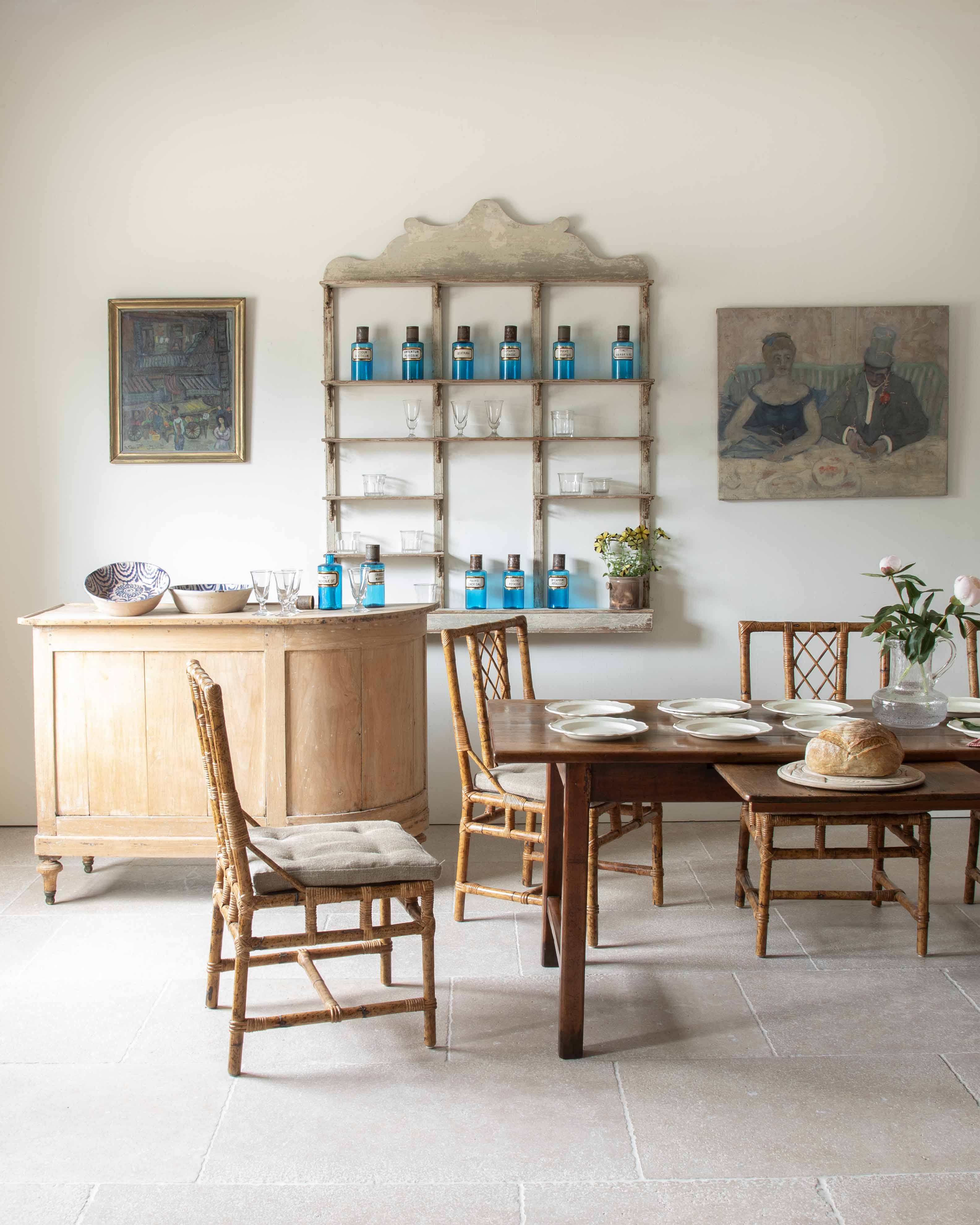An antique garden table and chairs with garden accessories from our lookbook 'La Terrasse Du Jardin'.