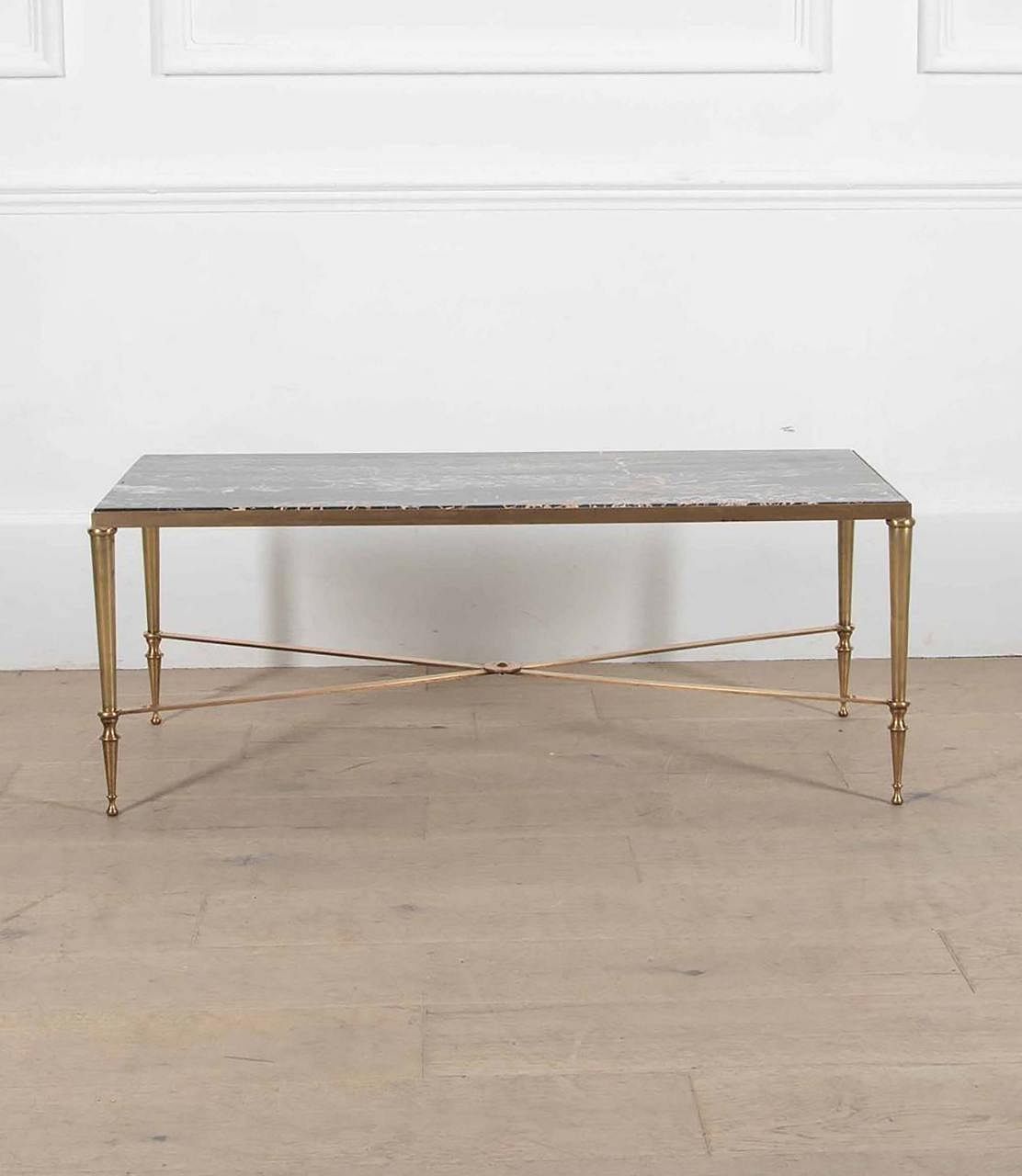 A Neoclassical coffee table by Maurice Rinck.